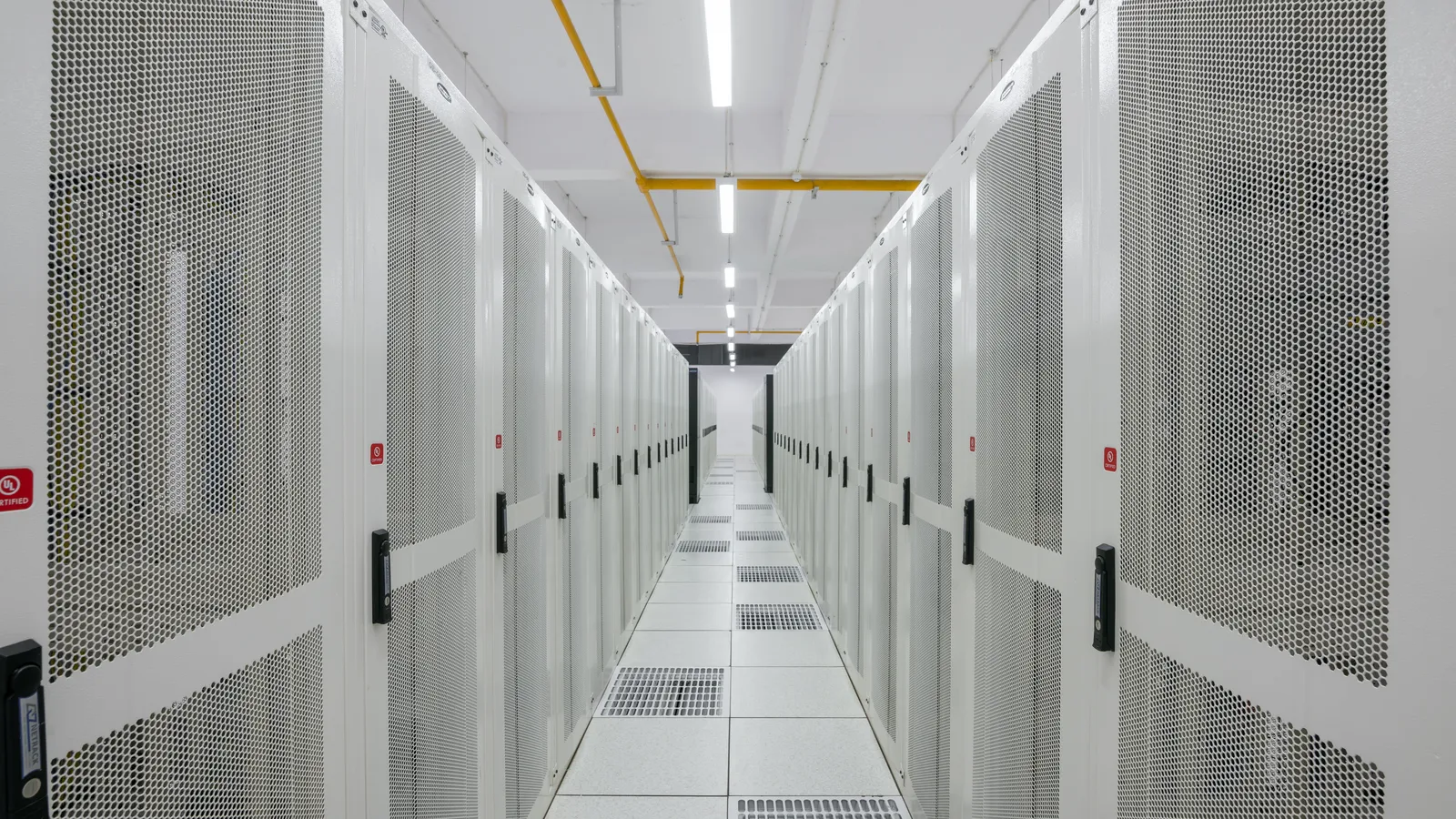 Rows of server racks in a data centre in Amravati, India