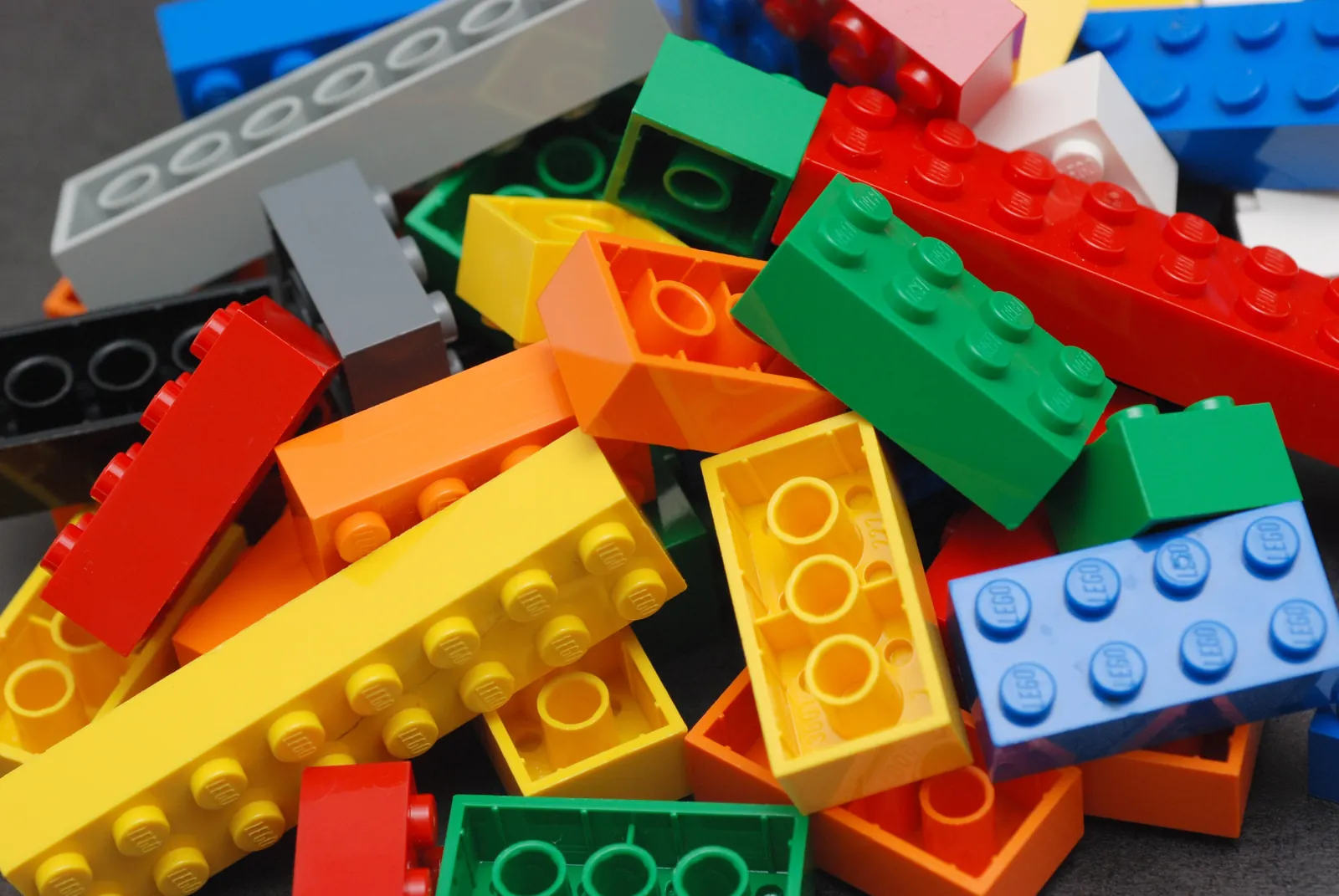A pile of colorful toy building bricks