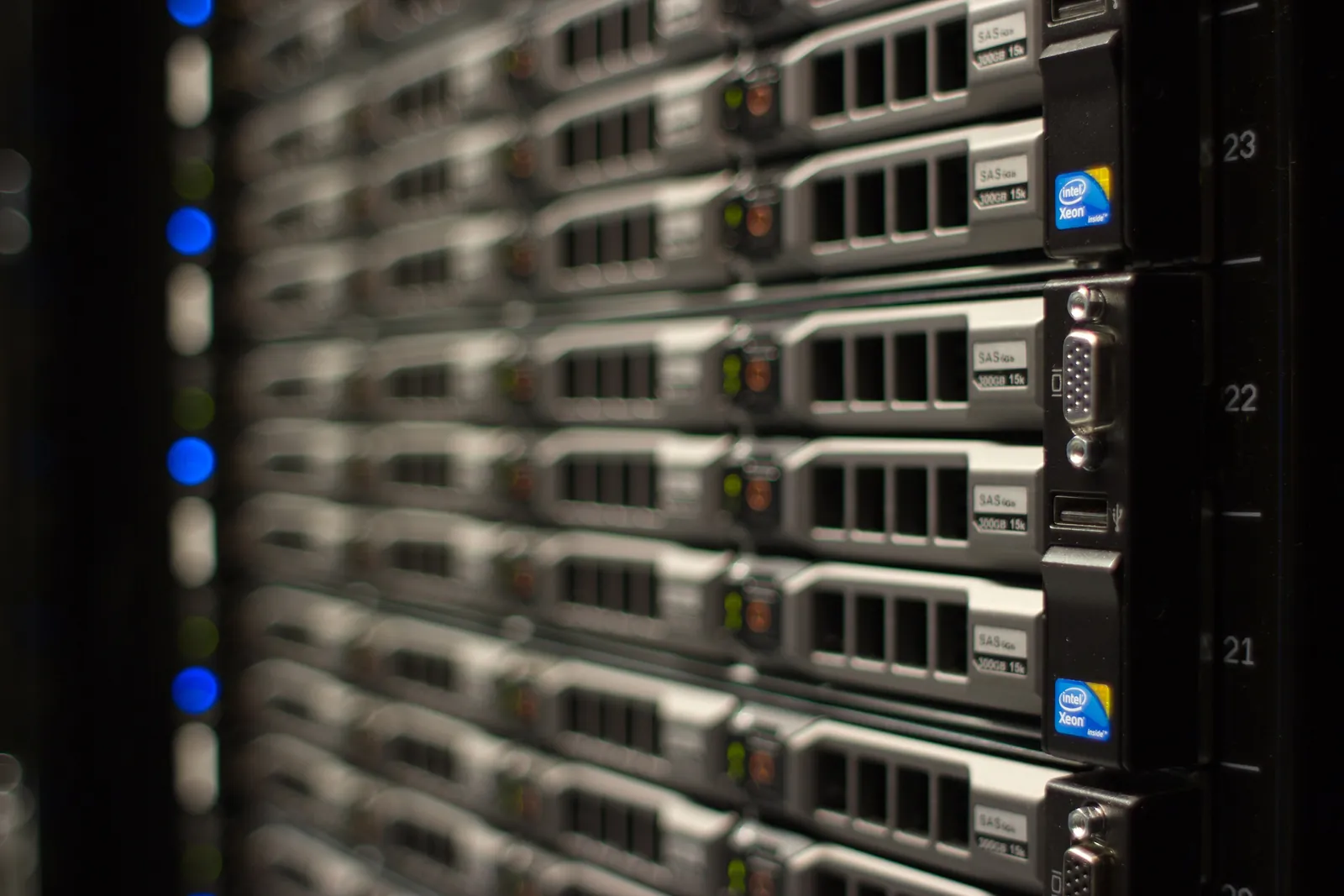 Close-up of server racks with blue status lights