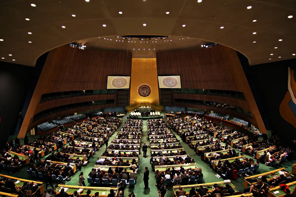 The United Nations General Assembly hall seen from above, full of delegates